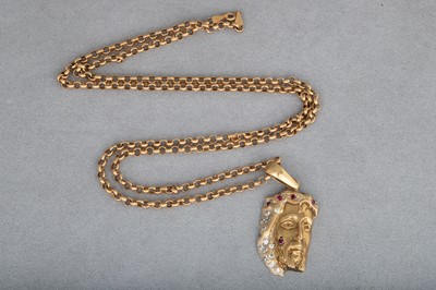 Lot 59 - A 9CT GOLD RELIGIOUS PENDANT, on a belcher...