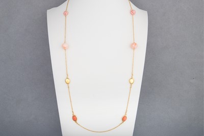 Lot 165 - A PINK CORAL NECKLACE, carved, beaded and...