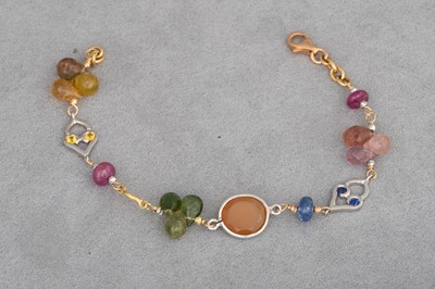 Lot 171 - A MULTI GEM SET BRACELET, faceted and beaded...