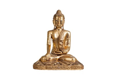 Lot 181 - A MODERN CARVED AND GILT SEATED BUDDA, with...
