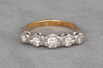 Lot 136 - A VINTAGE DIAMOND FIVE STONE RING, the...