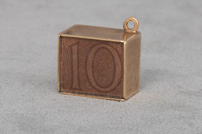 Lot 149 - A VINTAGE 9CT GOLD 'EMERGENCY MONEY' CHARM,...