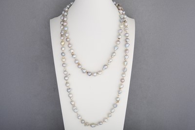 Lot 185 - A STRING OF GREY RIVER PEARLS, to a 14ct gold...