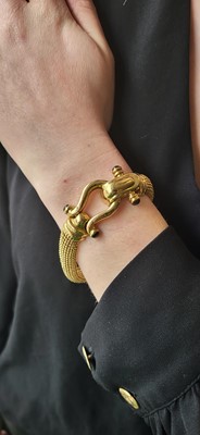 Lot 330 - AN 18CT GOLD BRACELET, woven mesh shape with...