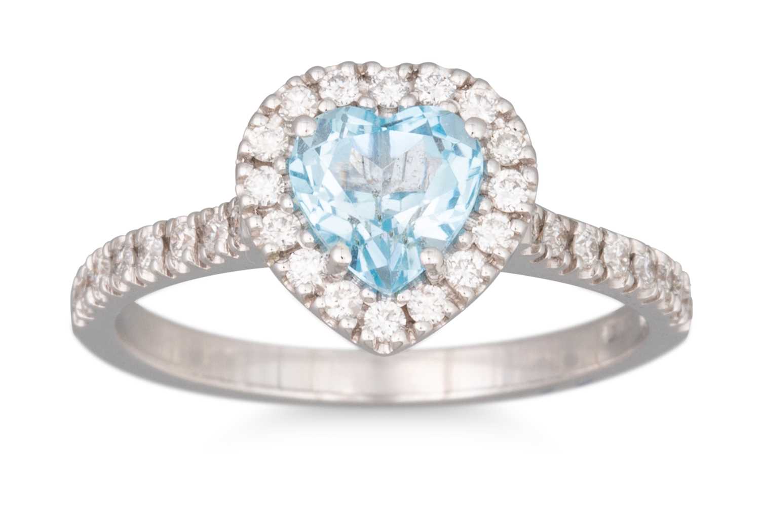 Lot 264 - A BLUE TOPAZ AND DIAMOND CLUSTER RING, heart...