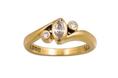 Lot 237 - A THREE STONE DIAMOND RING, set with a pear...