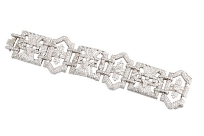 Lot 432 - A DIAMOND BRACELET, of openwork geometric form,...