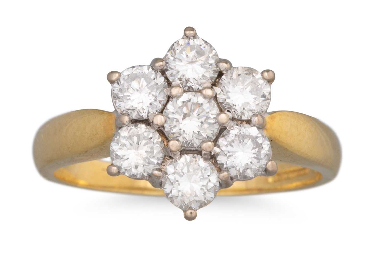 Lot 75 - A DIAMOND DAISY CLUSTER RING, mounted in 18ct...
