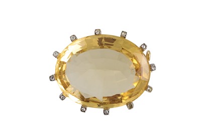 Lot 335 - A VINTAGE CITRINE AND DIAMOND BROOCH, the oval...