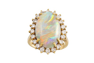 Lot 440 - A FINE QUALITY OPAL RING, the opal of dark...