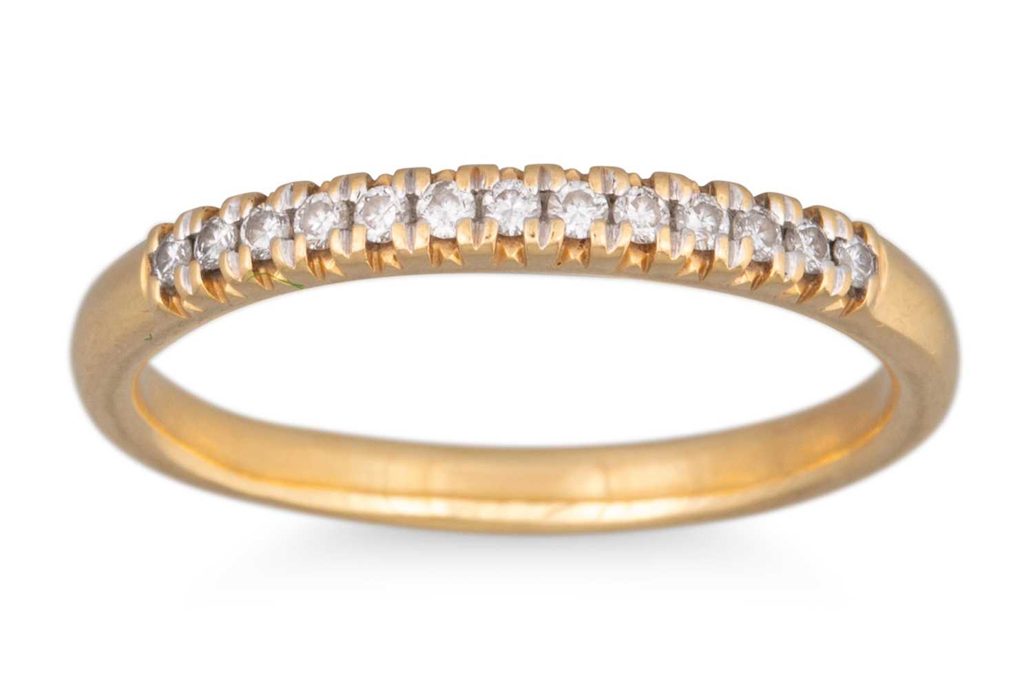 Lot 6 - A DIAMOND HALF ETERNITY RING, the round...