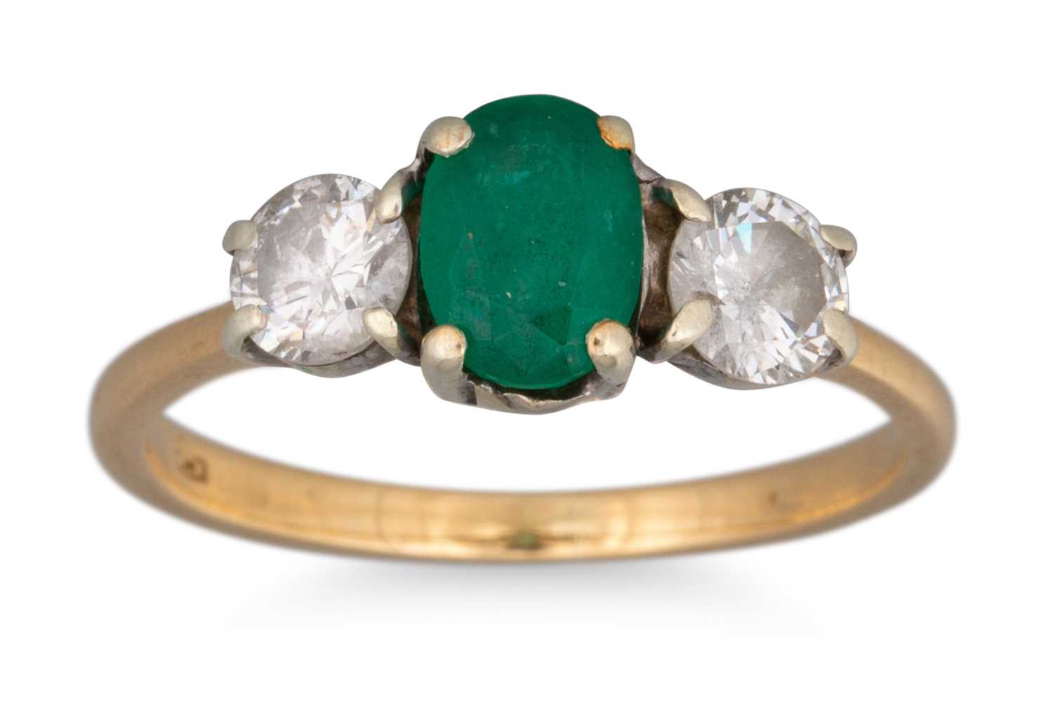 Lot 75 - AN EMERALD AND DIAMOND THREE STONE RING,...