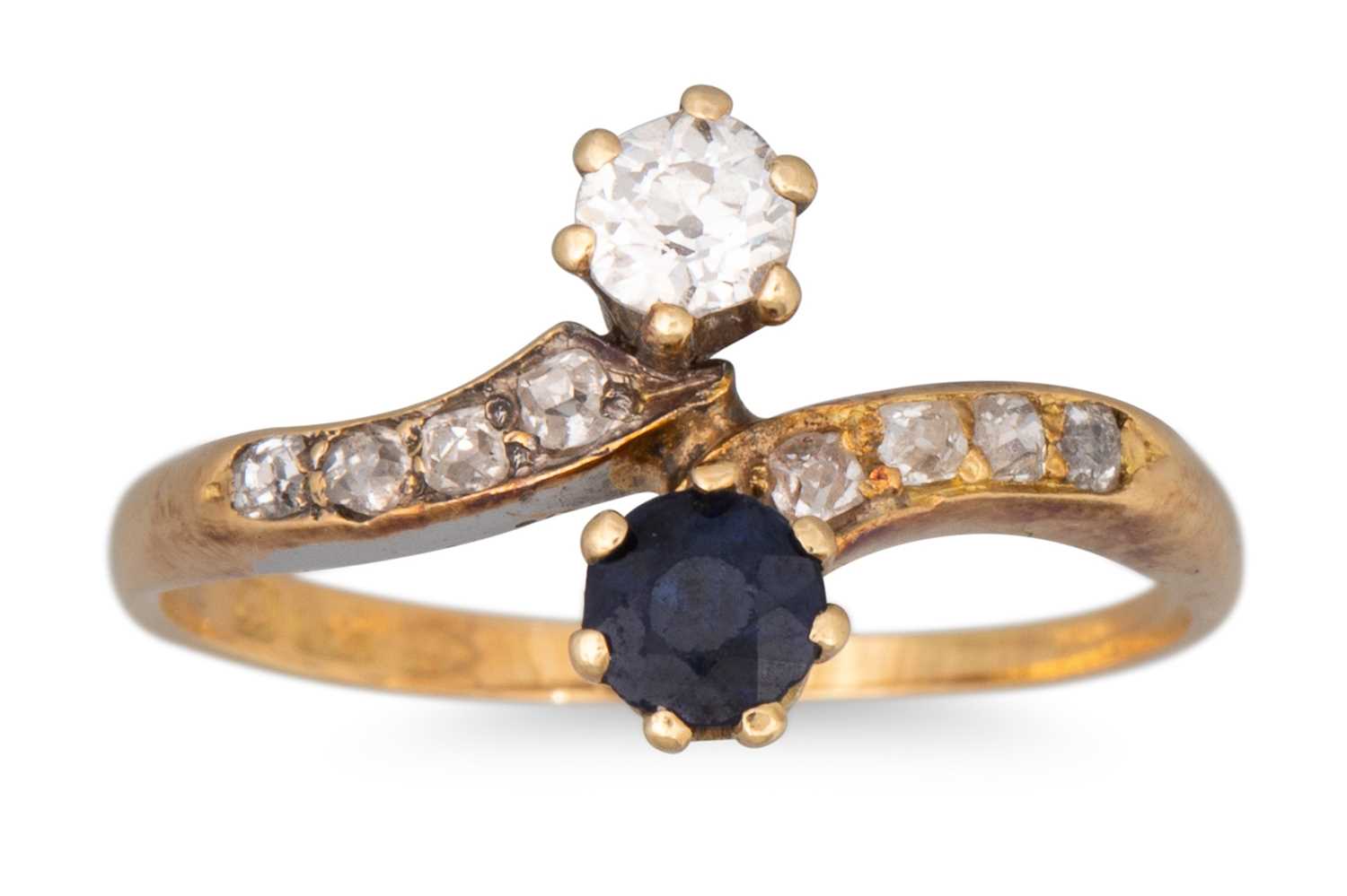 Lot 76 - A SAPPHIRE AND DIAMOND RING, cross over design,...