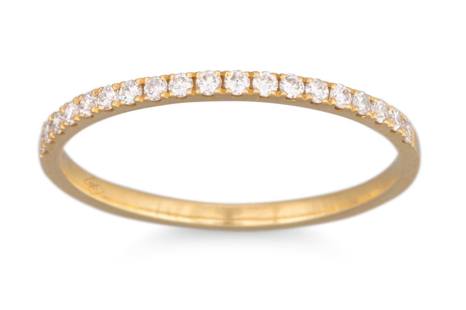 Lot 93 - A DIAMOND SET HALF ETERNITY RING, mounted in...