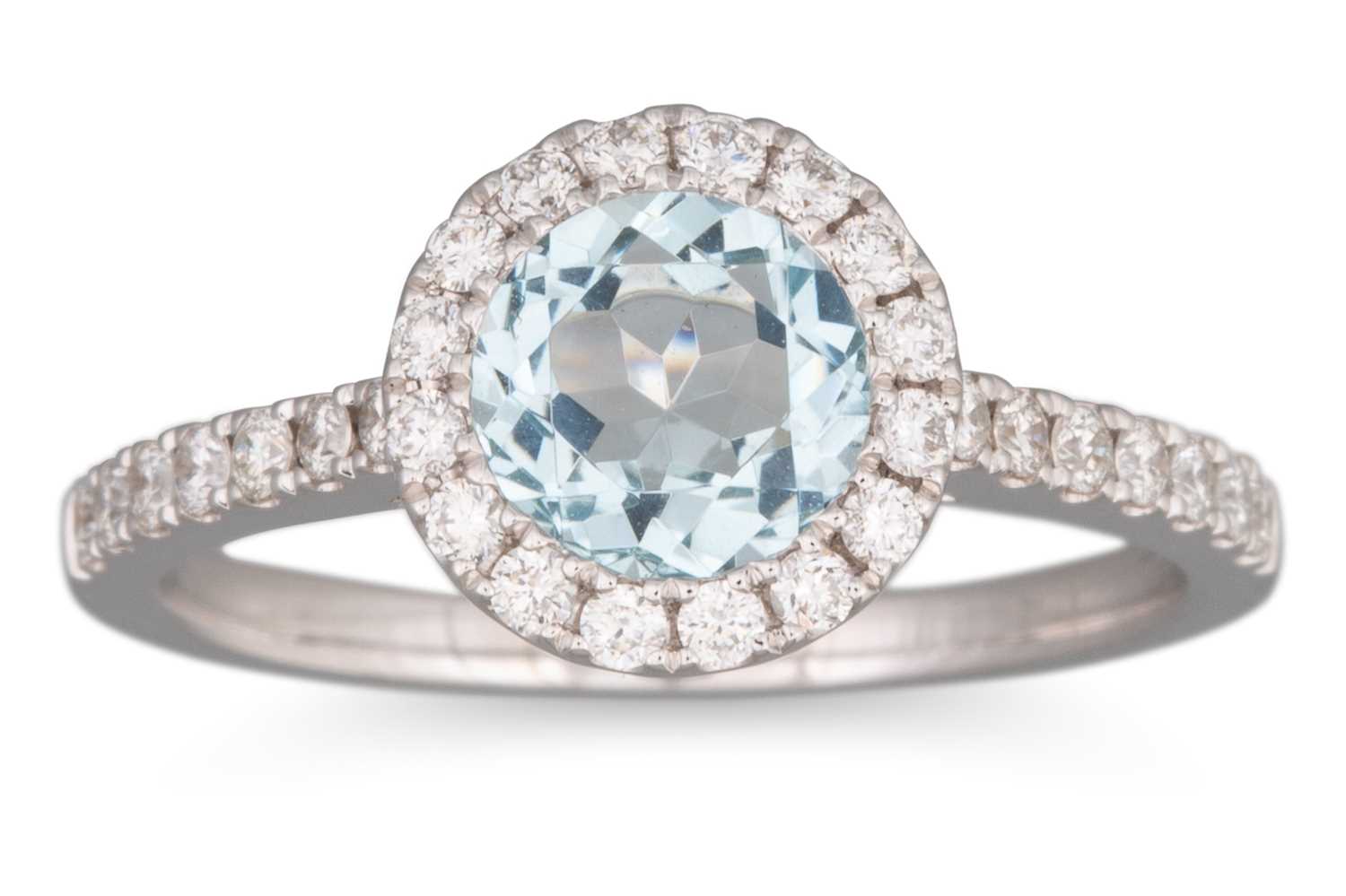 Lot 142 - AN AQUAMARINE AND DIAMOND CLUSTER RING, of...