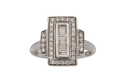 Lot 414 - A DIAMOND SET PLAQUE CLUSTER RING, set with...