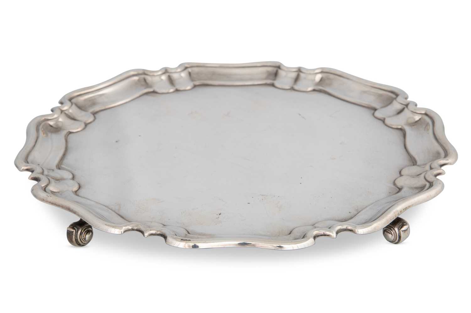 Lot 198 - A MID 20TH CENTURY SHAPED CIRCULAR SALVER,...