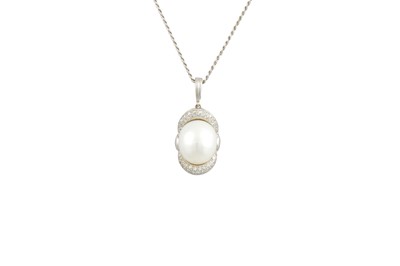 Lot 258 - A PEARL AND DIAMOND PENDANT, the large pearl...