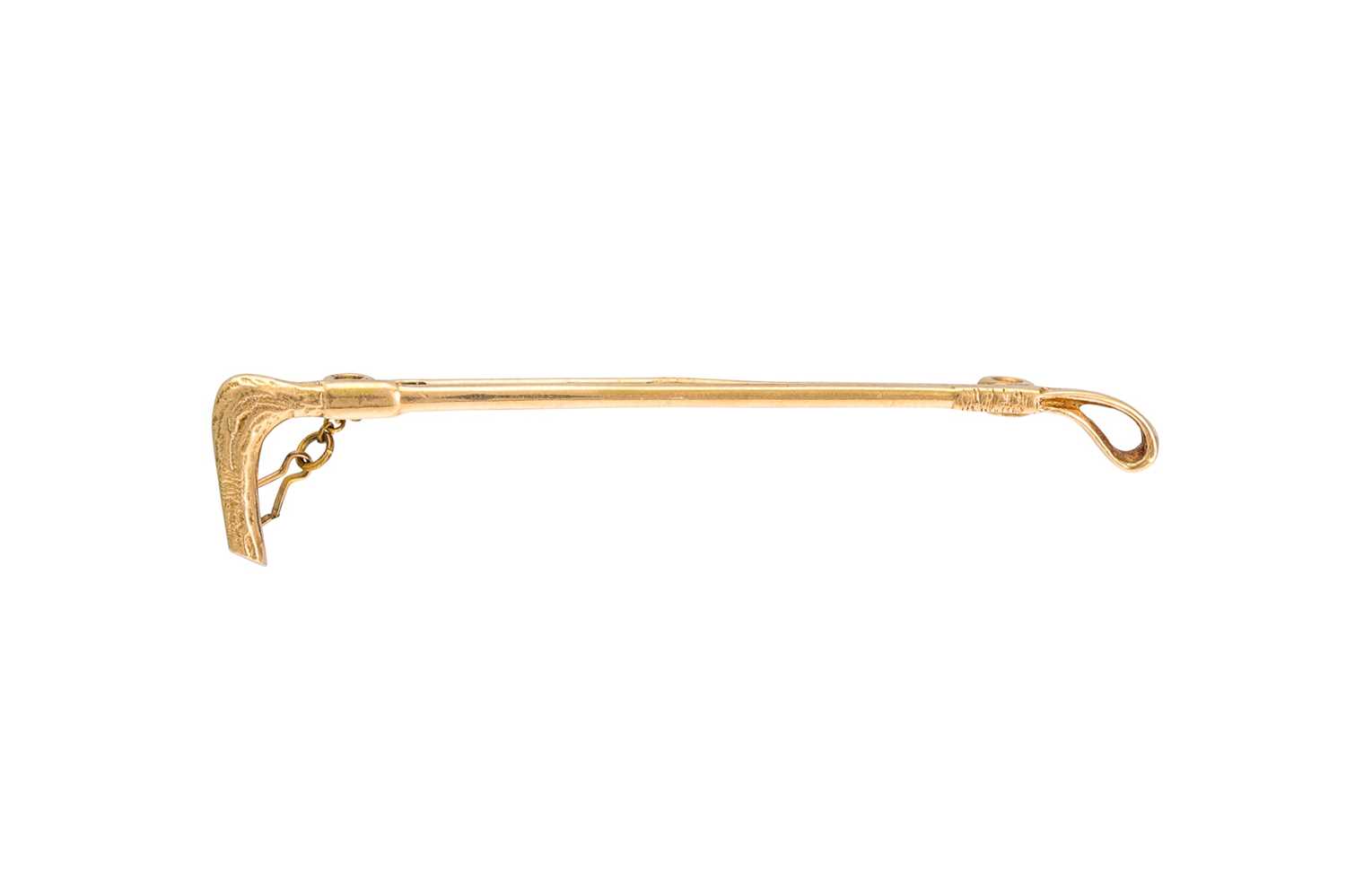Lot 313 - AN ANTIQUE BROOCH, modelled as a riding crop
