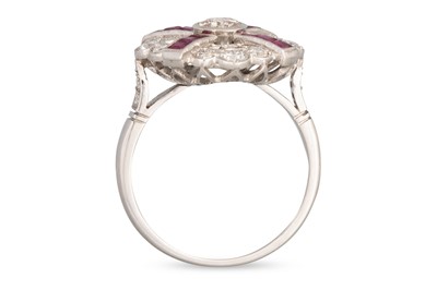 Lot 141 - A RUBY AND DIAMOND RING, of circular plaque...