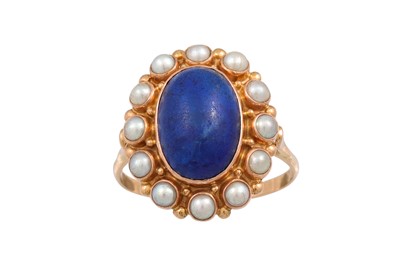 Lot 320 - A LAPIZ LAZULI AND PEARL CLUSTER RING, mounted...