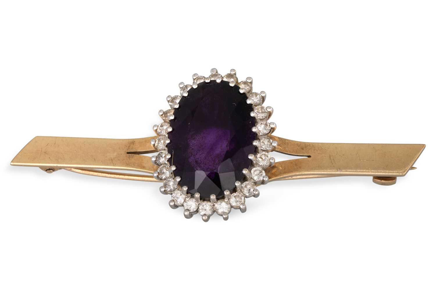 Lot 115 - AN AMETHYST AND DIAMOND CLUSTER BROOCH, on...
