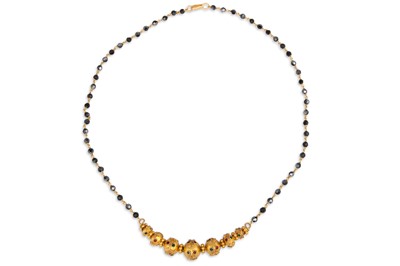 Lot 116 - AN EASTERN STYLE BEADED GOLD NECKLACE, 19 g....