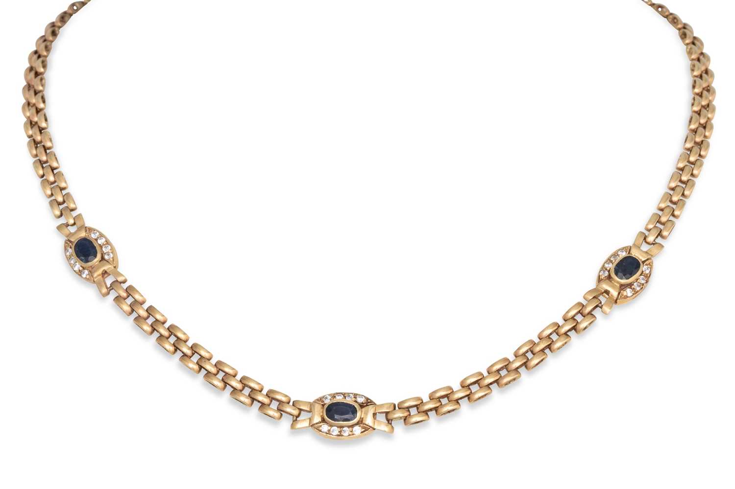 Lot 119 - A 9CT GOLD BRICK LINK NECKLACE, set with blue...