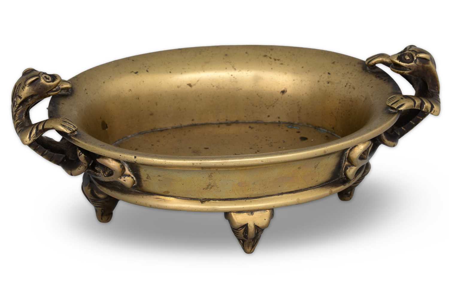 Lot 258 - AN ORIENTAL BRONZE SOAPDISH, in an oval form...