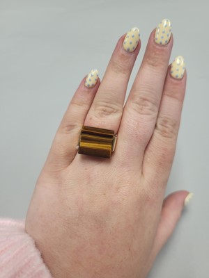 Lot 168 - A 1970'S TIGER'S EYE SET RING, of square form,...