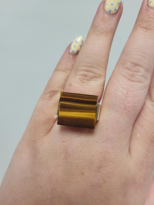 Lot 168 - A 1970'S TIGER'S EYE SET RING, of square form,...