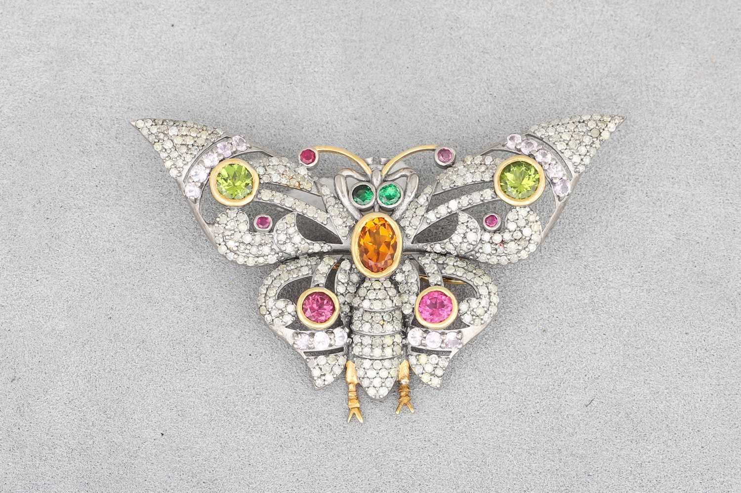 Lot 66 - A MULTI-GEM SET BROOCH, modelled as a...