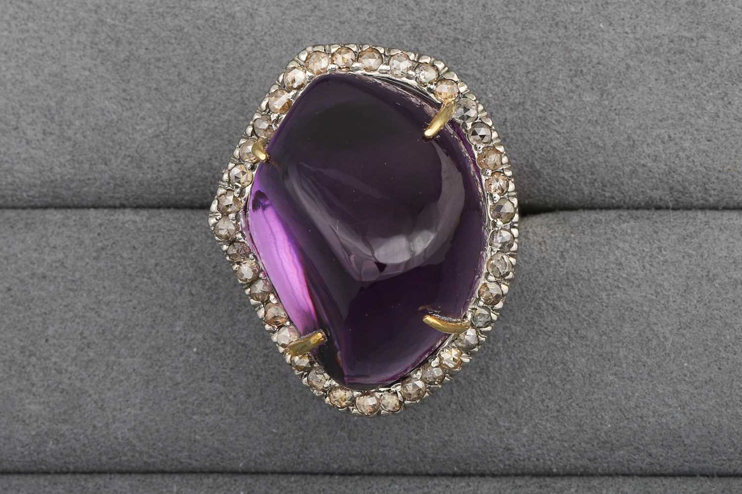 Lot 71 - AN AMETHYST AND DIAMOND CLUSTER RING, the...