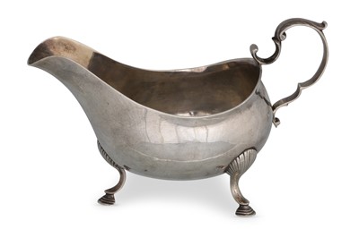 Lot 484 - A GEORGE III SILVER HELMET SHAPED SAUCE BOAT,...