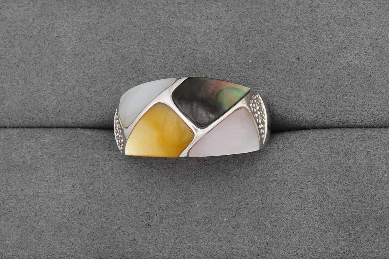 Lot 60 - A MOTHER OF PEARL AND DIAMOND RING, mounted in...