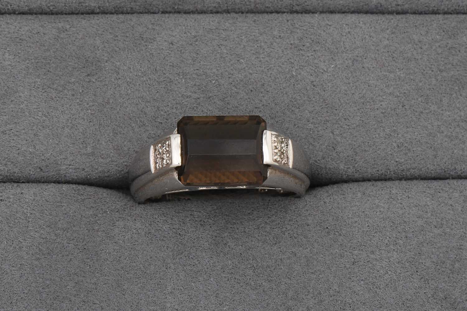 Lot 67 - A SMOKEY QUARTZ RING, to diamond shoulders,...
