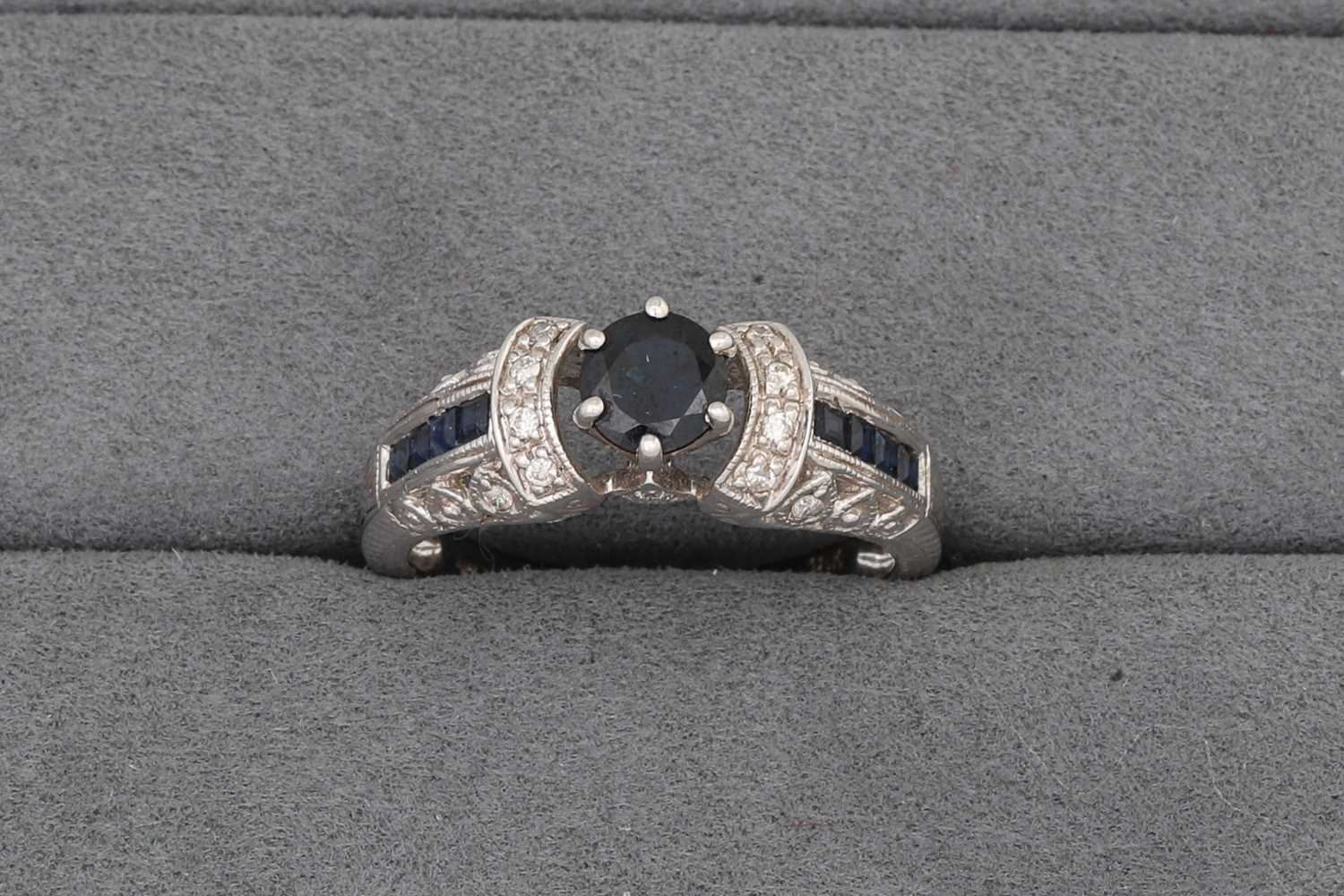 Lot 72 - A SAPPHIRE AND DIAMOND DRESS RING, mounted in...