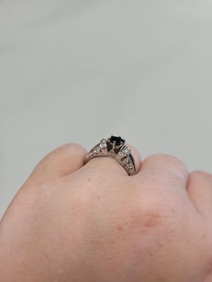 Lot 72 - A SAPPHIRE AND DIAMOND DRESS RING, mounted in...