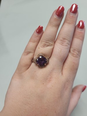Lot 76 - AN AMETHYST AND DIAMOND CLUSTER RING, of...