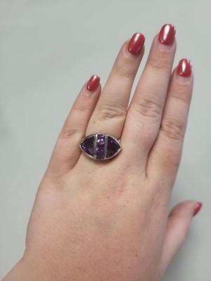 Lot 79 - AN AMETHYST AND DIAMOND CLUSTER RING, mounted...