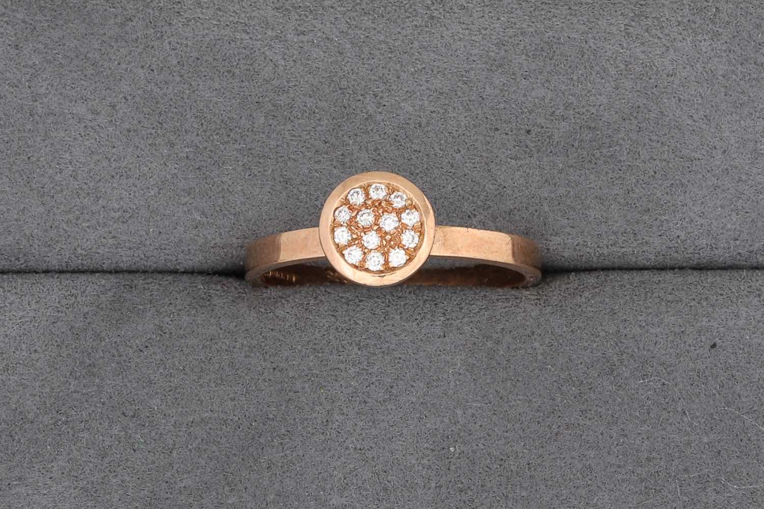 Lot 81 - A PAVÉ SET DIAMOND CLUSTER RING, mounted in...