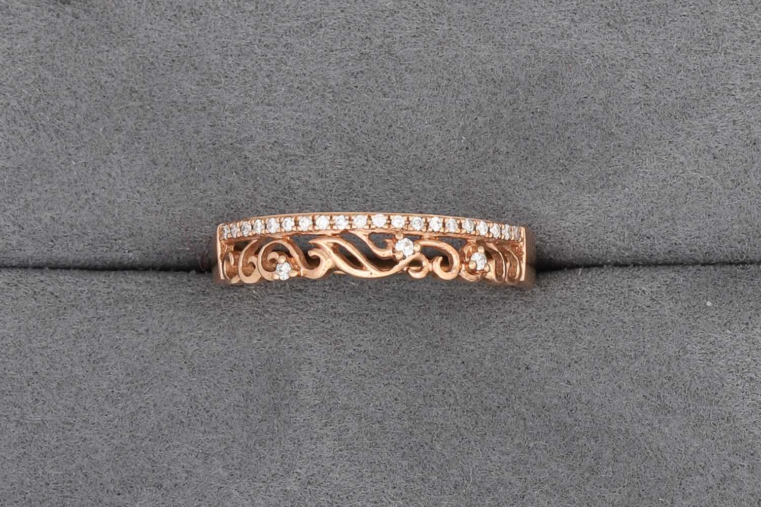 Lot 83 - A DIAMOND TWO-ROWED RING, in 10ct rose gold,...