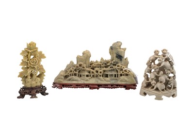 Lot 461 - THREE SOAPSTONE CARVINGS, one depicting a...