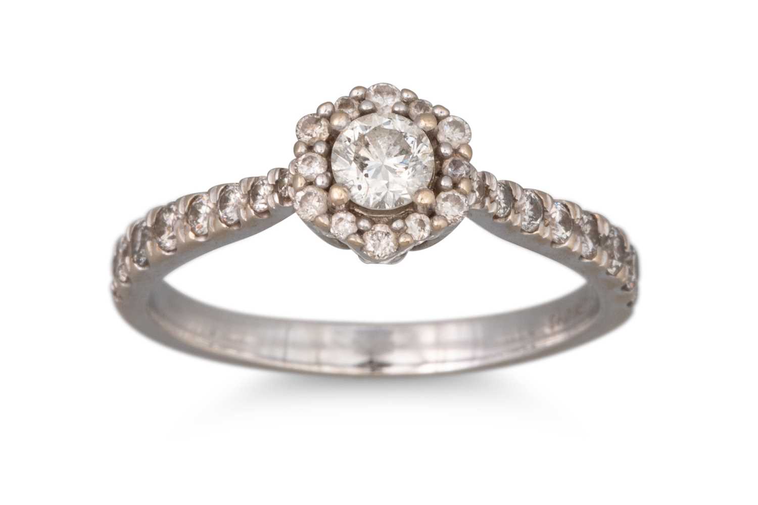 Lot 17 - A DIAMOND HALO CLUSTER RING, the principal...