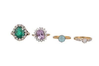 Lot 110 - FOUR STONE SET DRESS RINGS, gold mounted 12 g.