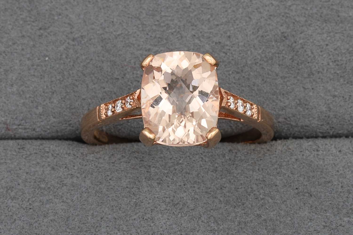 Lot 85 - A MORGANITE RING, to diamond shoulders,...