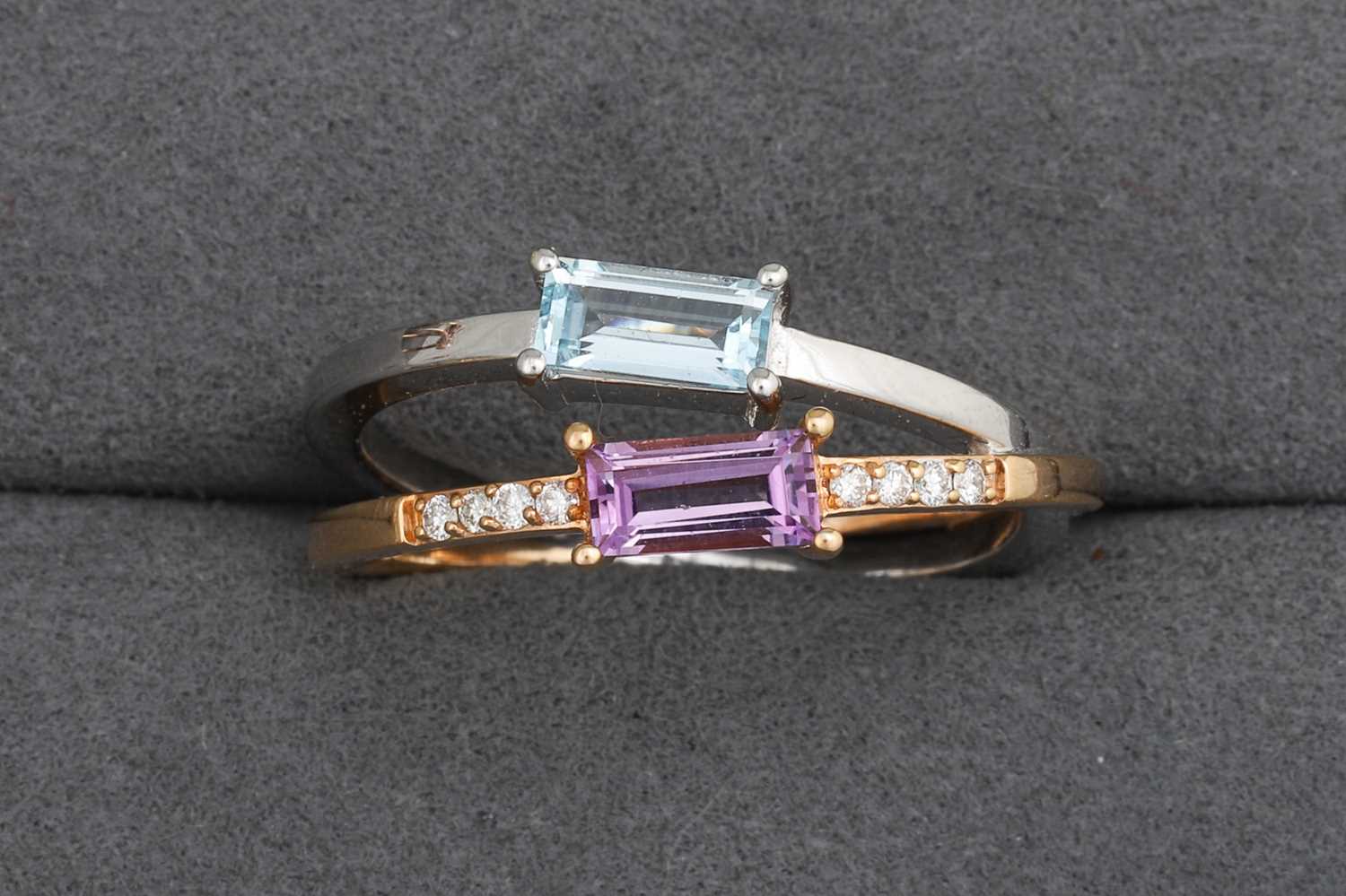 Lot 88 - AN AMETHYST TOPAZ AND DIAMOND TWO ROWED RING,...
