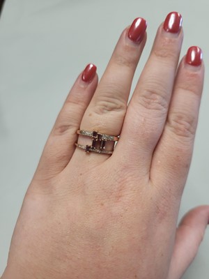 Lot 90 - A CONTEMPORARY RHODOLITE AND DIAMOND RING,...