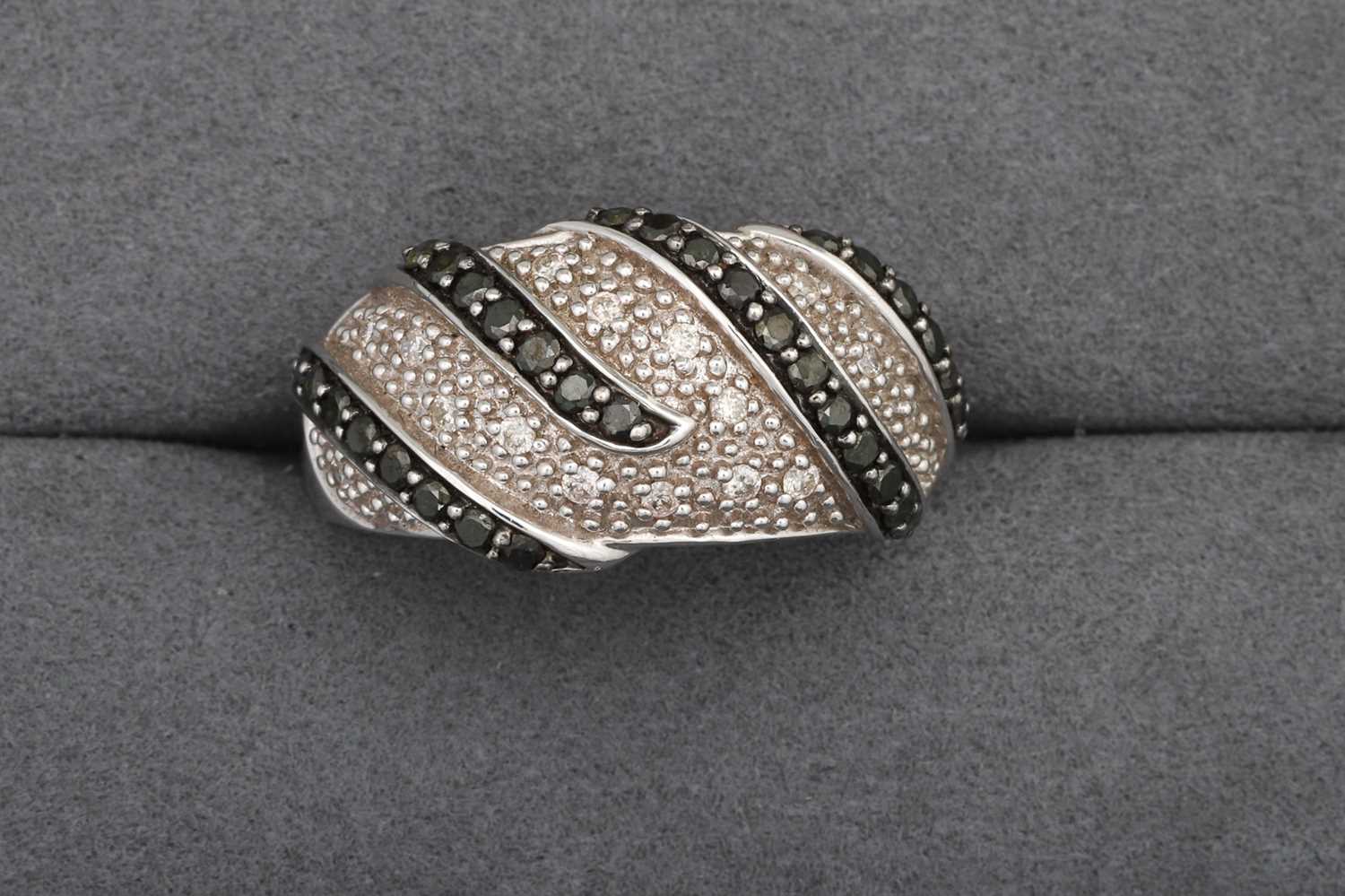 Lot 96 - A DIAMOND RING, pavé set in 14ct white gold,...