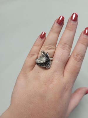 Lot 97 - A DIAMOND CLUSTER RING, pavé set in 14ct white...